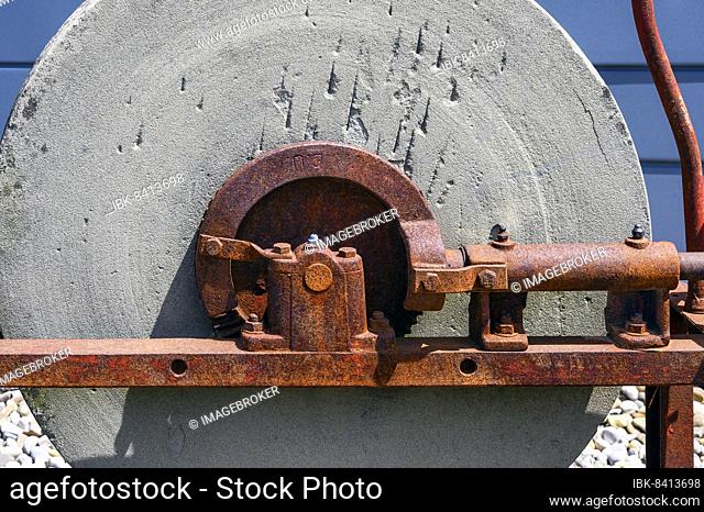 Old grindstone with rusted mechanics, Buchenberg, Bavaria, Germany, Europe