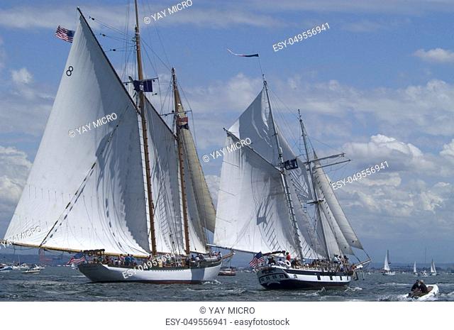 Two gaff rigged schooners reaching, as if in a race