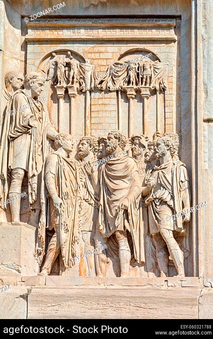 Rome, Italy - Oct 03, 2018: Rex Datus - Detail of the triumphal arch of Constantine. The bas-relief on the south side of the