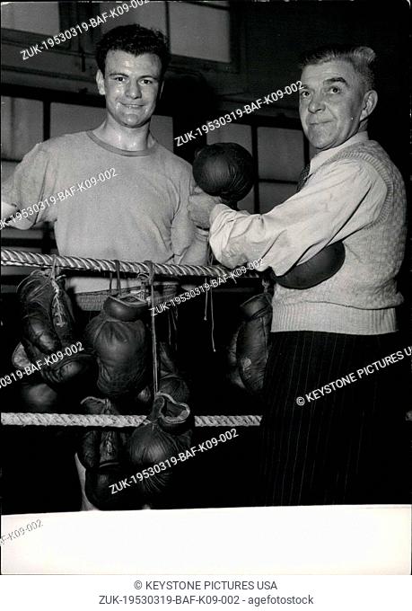 Mar. 19, 1953 - Cliff Curvis V. Gilbert Lavoine in Paris next Sunday; Cliff is seen here with his father who is also his coach and trainer while training at the...