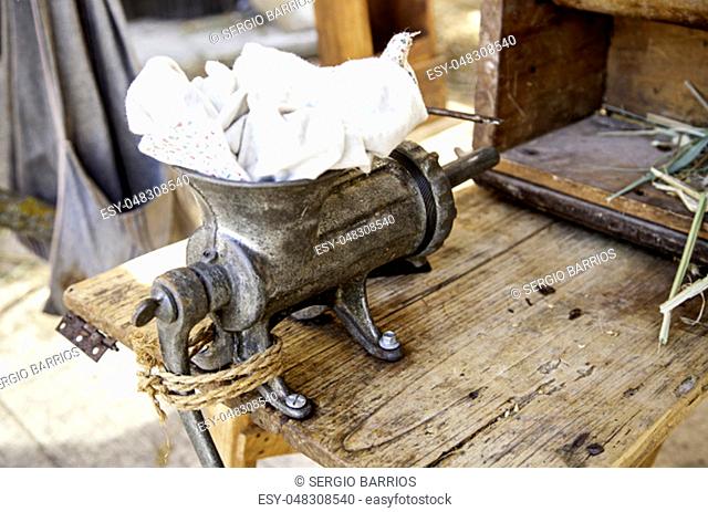 Old metal meat grinder, kitchen utensil detail