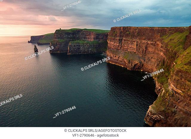 Cliffs of Moher (Aillte an Mhothair), Doolin, County Clare, Munster province, Ireland, Europe. Aerial view of the cliffs at sunset