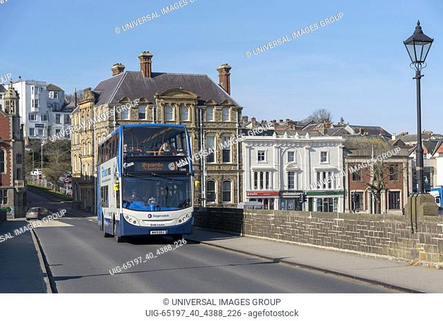 Bideford, North Devon, England UK. February 2019. A double decker bus passing over the Bideford Long Bridge enroute to Ilfracombe, Devon