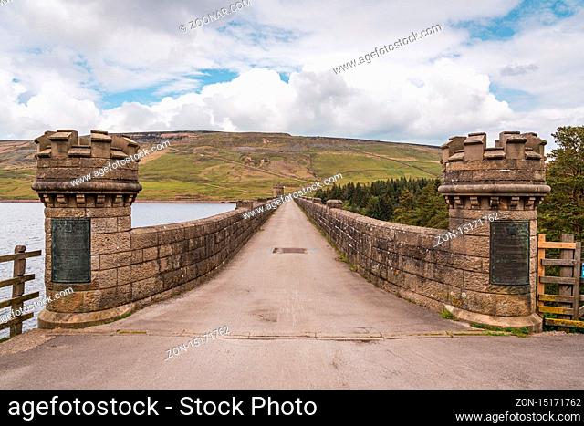 Near Middlesmoor, North Yorkshire, England, UK - May 19, 2019: The road over the dam of the Scar House Reservoir
