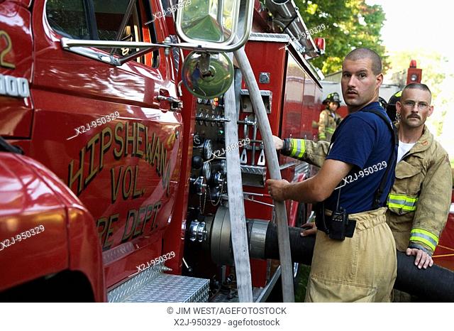 Shipshewana, Indiana - The Shipshewana Volunteer Fire Department at a barn fire  The fire fighters purposely burned the derelict barn as a favor to the owner...