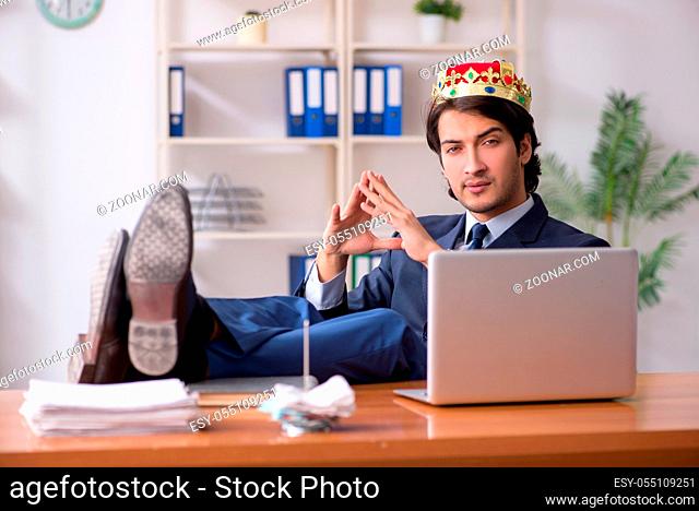 Young king businessman working in the office