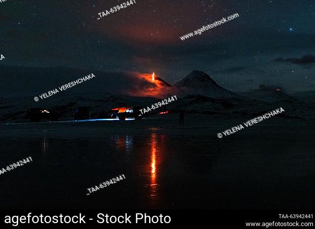 RUSSIA, KAMCHATKA REGION - OCTOBER 24, 2023: A view of Kamen dormant stratovolcano and erupting Klyuchevskaya Sopka (Klyuchevskoi) and Bezymyanny active...