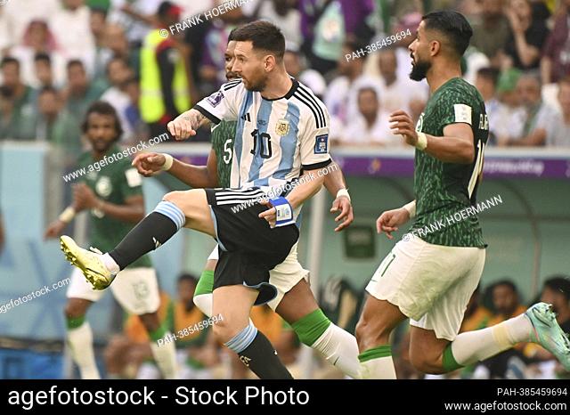 Lionel MESSI (ARG) on the ball, action. Re:SALEH ALSHEHRI (KSA). Game 8, Group C Argentina (ARG) - Saudi Arabia (KSA) on 22.11.2022, Lussail Stadium