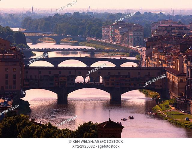 Florence, Florence Province, Tuscany, Italy. View to bridges across Arno river. Ponte Vecchio in foreground. The historic centre of Florence is a UNESCO World...
