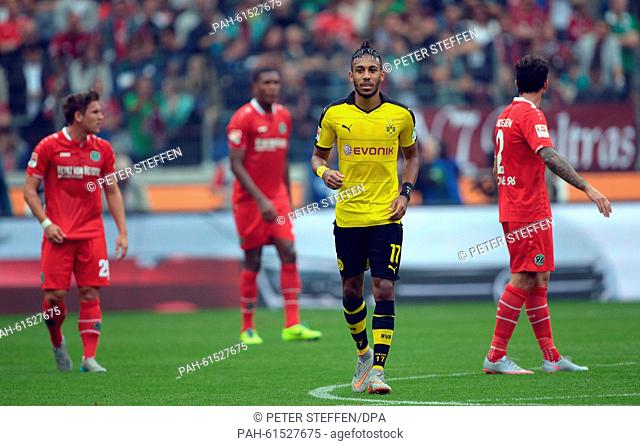 Dortmund's Pierre-Emerick Aubameyang (second from right) celebrates his goal at 1:1 during the German Bundesliga soccer match between Hannover 96 and Borussia...