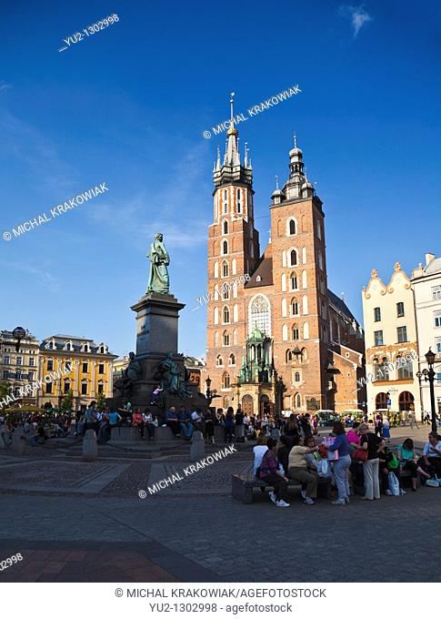 Krakow landmarks - Basilica of Virgin Mary on Main Market Square and Adam Mickiewicz Monument