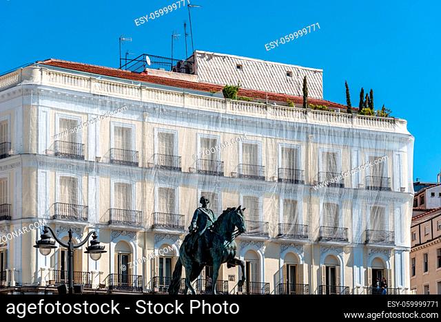 Madrid, Spain - April, 18 2021: Low Angle View of The Statue of the Spanish King Charles III in Puerta del Sol Square in Central Madrid