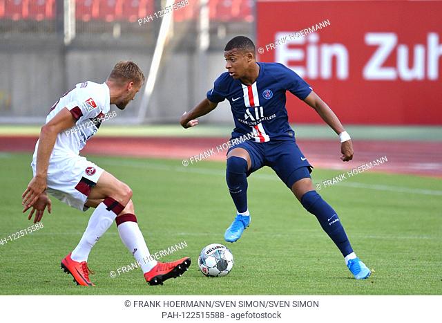 Kylian MBAPPE (PSG), action, duels versus Hanno BEHRENS (.1.FC Nuremberg) 1.FC Nuremberg-Paris Saint Germain (PSG), on 20.07