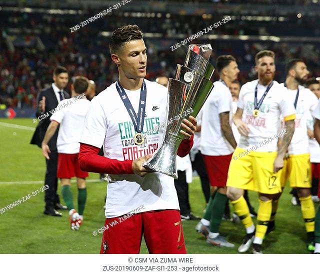 June 9, 2019 - Porto, United Kingdom - Cristiano Ronaldo of Portugal looks at the trophy during the UEFA Nations League match at the Estadio do Dragao, Porto