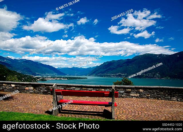 Bench with Panoramic View over Alpine Lake Maggiore with Mountain in Ronco sopra Ascona, Switzerland
