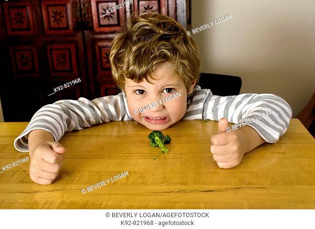 Five year old boy who doesn't want to eat broccoli