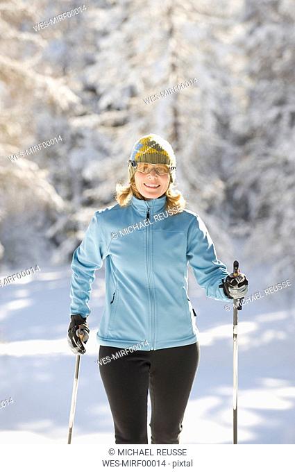 Austria, Tyrol, Seefeld, Woman cross country skiing