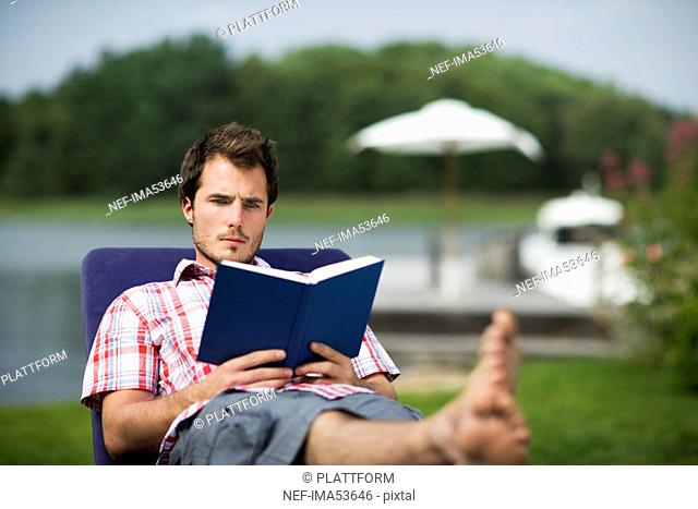 A man reading a book, Sweden
