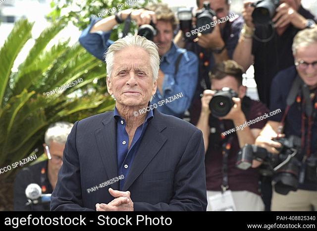 CANNES, FRANCE - MAY 16: Michael Douglas attends a photocall as he receives an honorary Plme D'Or at the 76th annual Cannes film festival at Palais des...
