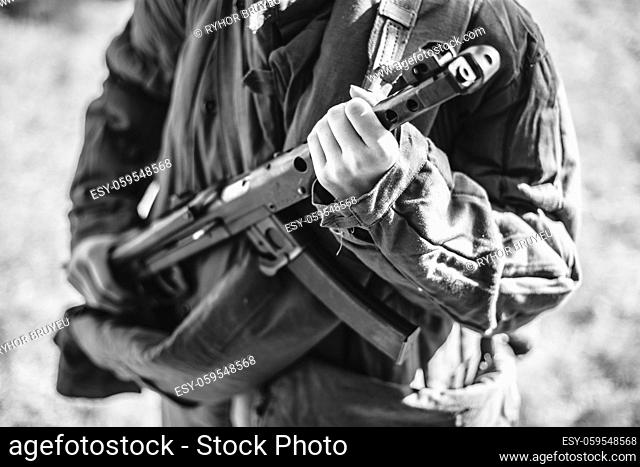 Woman Re-enactor Dressed As World War Ii Soviet Russian Red Army Soldier Holding World War II Weapon Submachine Gun Pps-43