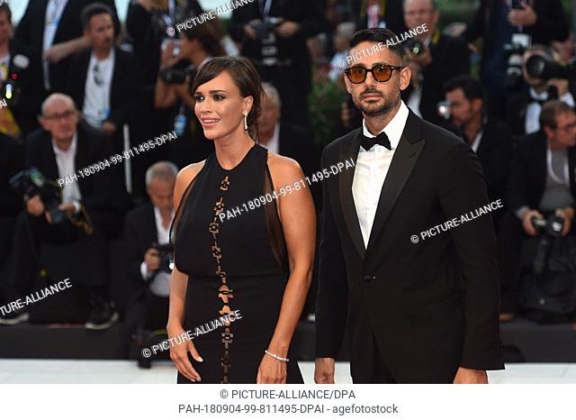 03.09.2018, Italy, Venice: The actress Roberta Giarrusso and Riccardo Di Pasquale can be seen on the red carpet of the film screening ""At Eternity's Gate'"" at...