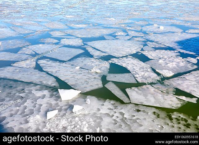 Ice sheets on a frozen water body