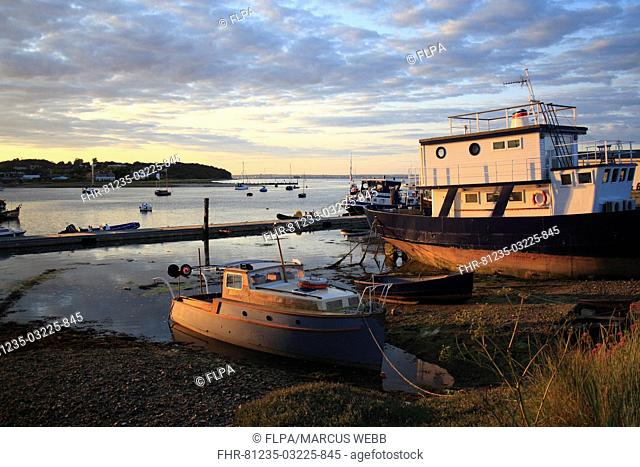 Boats in harbour at sunset, Bembridge Harbour, Bembridge, Isle of Wight, England, june