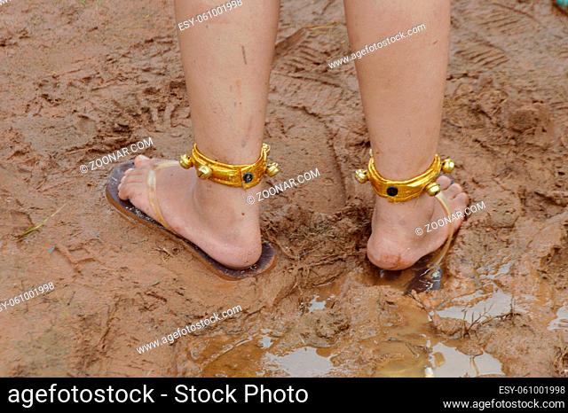 traditional anklet on a woman's feet