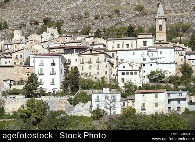 cityscape with old houses and san Nicola Church bell tower at historical village, shot in bright light at Calascio, L'Aquila, Abruzzo, Italy