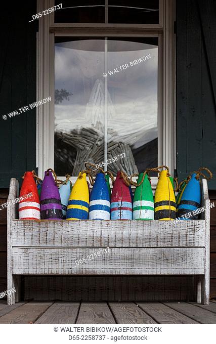 USA, North Carolina, Outer Banks National Seashore, Corolla, crayon-colored decorative buoys