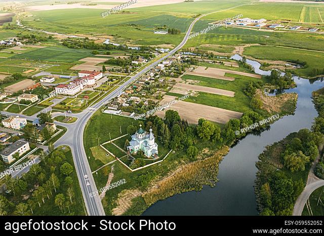 Krupets, Dobrush District, Gomel Region, Belarus. Aerial View Of Old Wooden Orthodox Church Of The Holy Trinity At Sunny Autumn Day