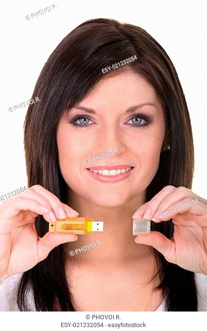 Attractive woman showing USB key