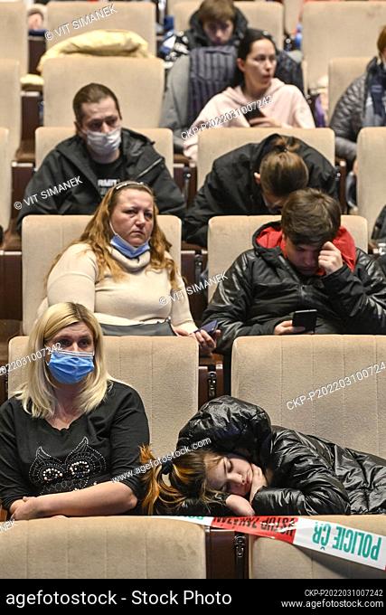 Displaced Ukrainians, fleeing the war as Russia invaded Ukraine on February 24, wait for a registration at Vysehrad Congress Centre in Prague, Czech Republic