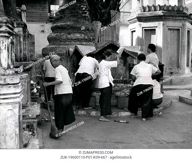 Mar. 02, 2012 - Luck - and the Siamese: Where neglect is bad luck. Bangkok ladies burn gold and silver leaf papers and imitation money so that the departed...