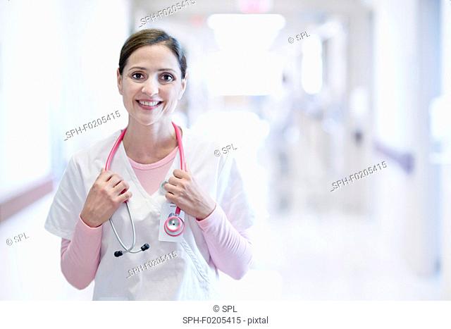 Nurse smiling towards camera with stethoscope