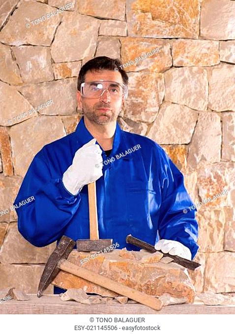 Masonry mason stonecutter man with hammer working