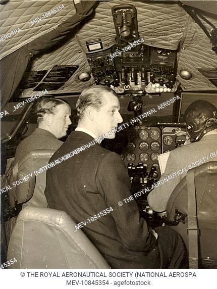 HRH The Prince Philip, Duke of Edinburgh, KG, HonFRAeS, RAeS Honorary President 1966, in the cockpit of a de Havilland Comet with John Cunningham