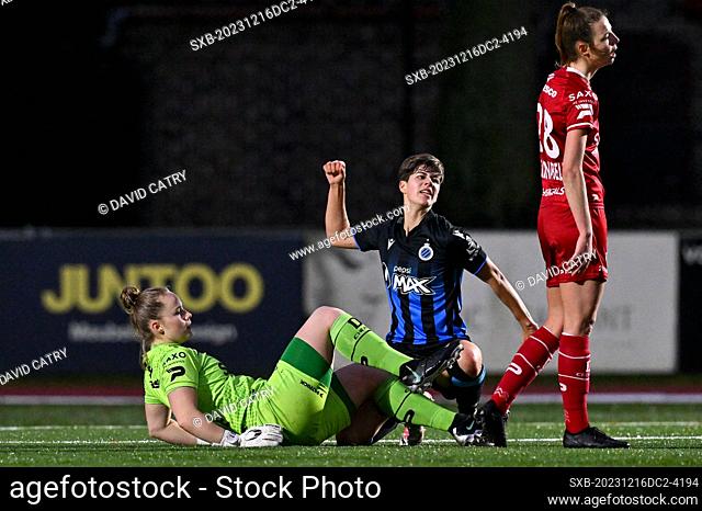 Isabelle Iliano (18) of Club YLA pictured celebrating after scoring the 1-0 goal while goalkeeper Lowiese Seynhaeve (1) of Zulte-Waregem and Nicky Van Den...
