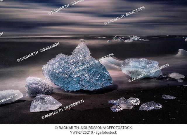 Ice formations on black sand beach. Ice comes from the Breidamerkurjokull Glacier, Vatnajokull Ice Cap, Iceland