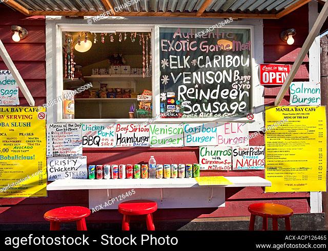 Food stand highlighing the fact that its fast-food items are prepared with wild game meat, Juneau, Alaska, USA