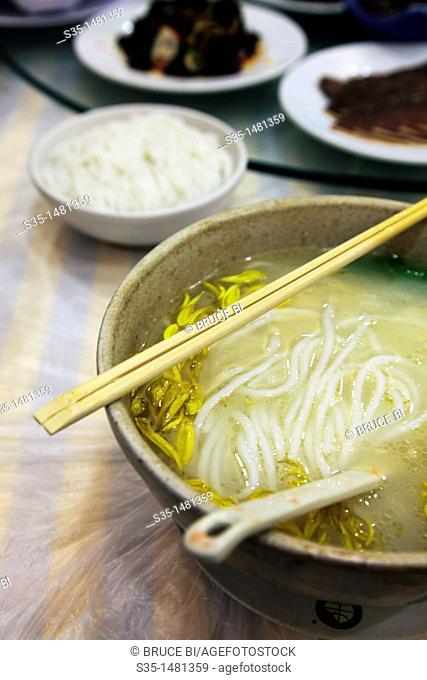 'Guoqiao mi xian' (Crossing the bridge noodles) a kind of rice noodle soup from Yunnan, Kunming, China