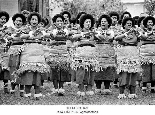 Local women dancing at traditional native kava ceremony at tribal gathering in Fiji, South Pacific