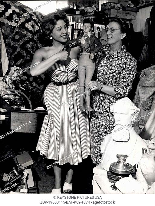 1957 - Carole Searchers For 'Props' In ' The Delighful Muddle: Who could pass a shop with a name like 'The Delightful Muddle'? Beautiful actress Carole Newton...