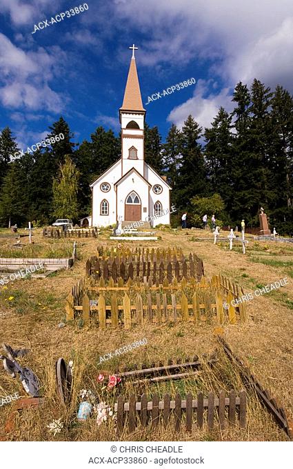 St. Ann Roman Catholic Church at Cowichan Bay with cemetary ay base of Mount Tzouhalem