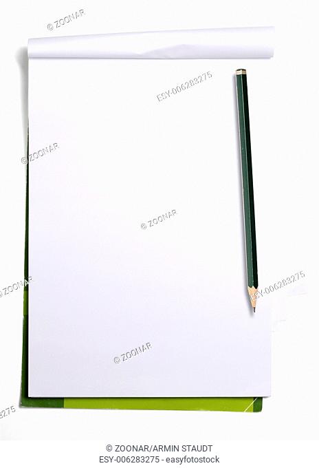used old blank paper tablet and old pencil, isolated on white