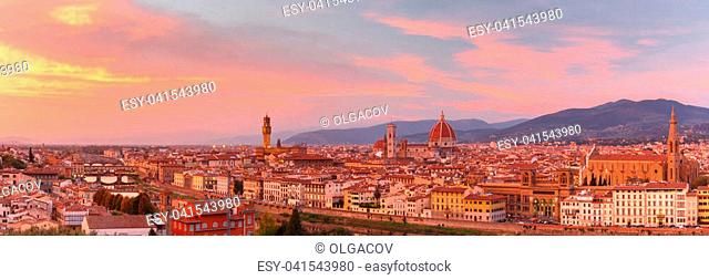 Panorama of Duomo Santa Maria Del Fiore, tower of Palazzo Vecchio and famous bridge Ponte Vecchio at gorgeous sunset from Piazzale Michelangelo in Florence