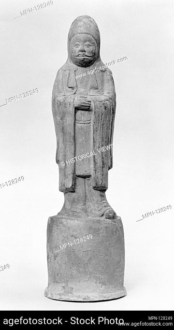 Official Standing on High Base. Date: 9th century; Culture: China; Medium: Terracotta; Dimensions: H. 14 7/8 in. (37.8 cm); Classification: Tomb Pottery