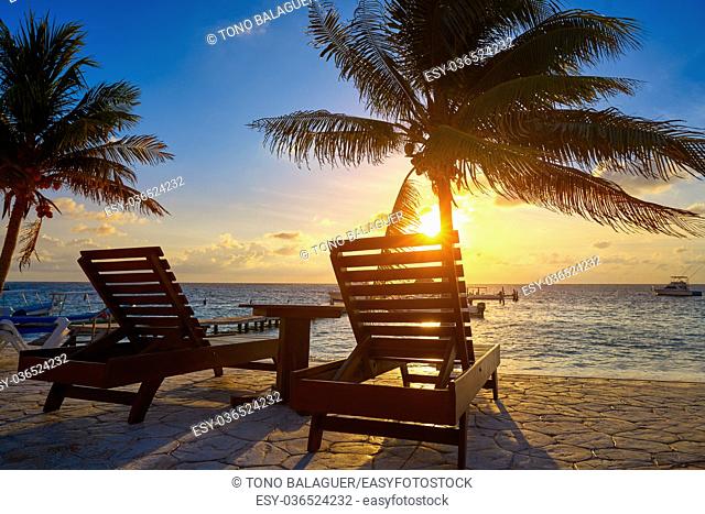 Riviera Maya sunrise beach hammocks and palm trees in Mayan Mexico