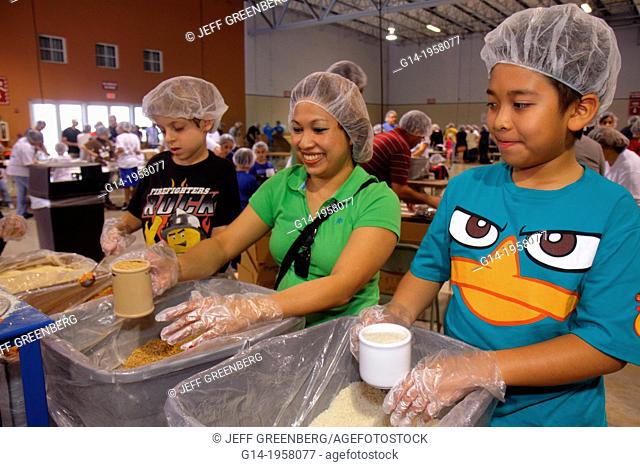 Florida, Miami, Miami-Dade County Fair And Expo, Feed My Starving Children, volunteer, community service, packing, meals, Asian, woman, mother, boy, son