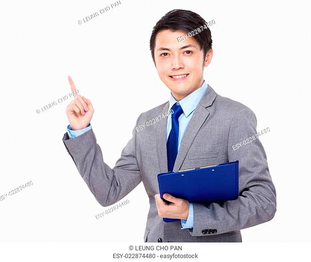 Businessman with clipboard and finger point up